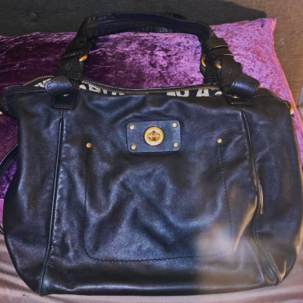 Marc Jacobs Black Leather Handbag. Bottom embellishment strap missing 2 pins